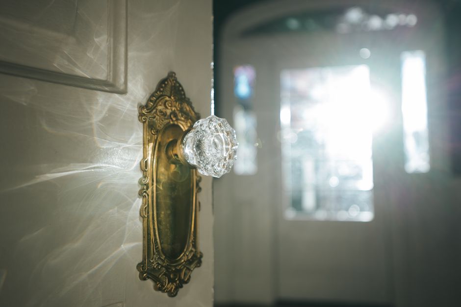 Close up of a brass door knob on a newly installed door